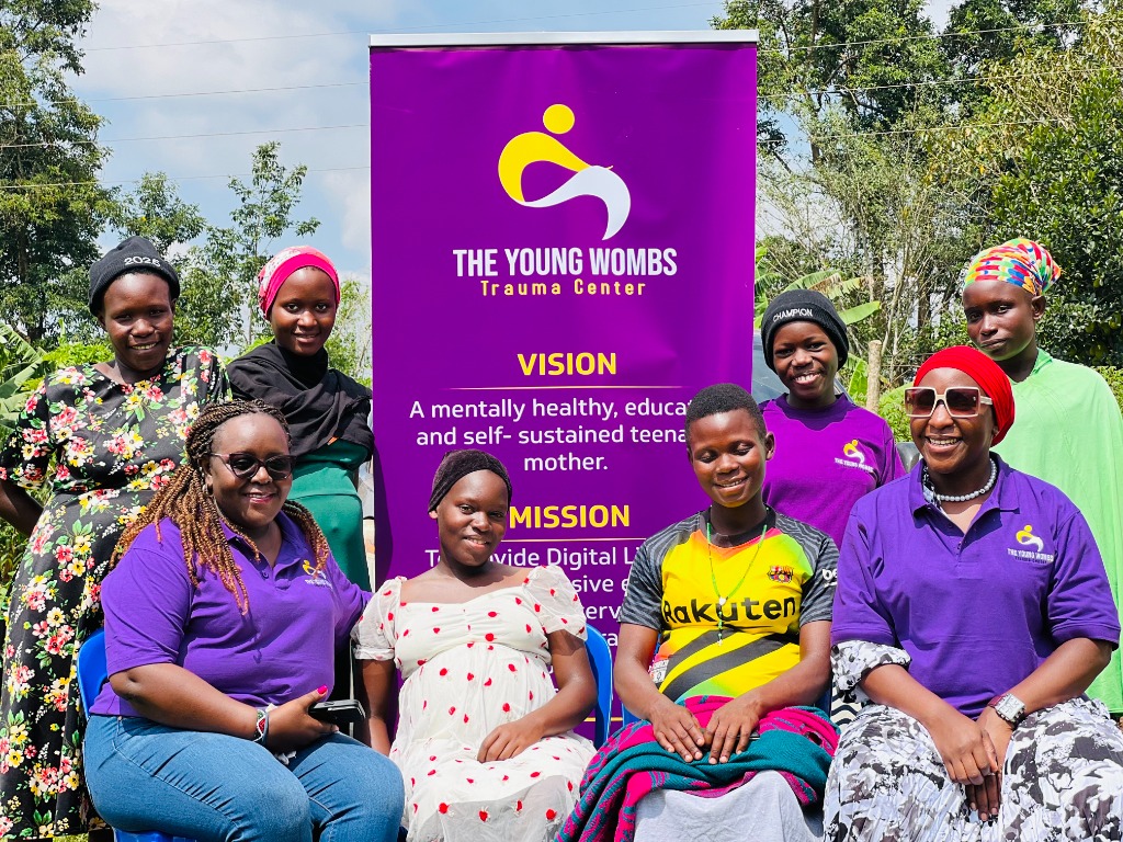 Young Wombs Trauma Centre team and participants with official banner
